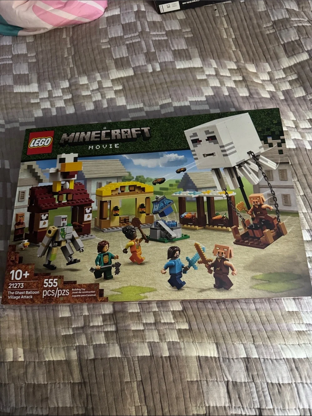 LEGO Minecraft Village Raid Set with Yellow and Brown Buildings
